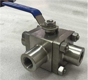 How does a pneumatic actuator work with a four - way ball valve?